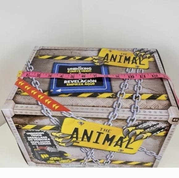 The Animal Unboxing Lights and Sounds Toy Truck - Picture 12 of 13